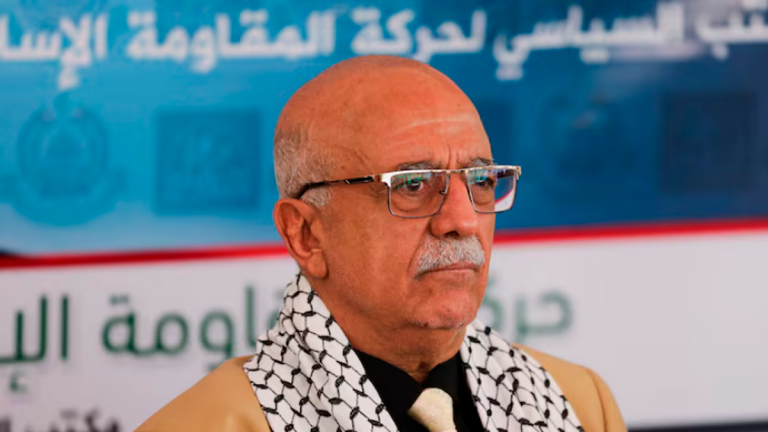 Head of the Houthi-led government Ahmad al-Rahawi looks on during a visit by Houthi government officials to the Hamas office in Sanaa, Yemen August 19, 2024. REUTERS/Khaled Abdullah/File Photo
