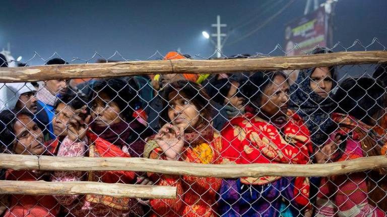 Devotees react after being stopped by policemen, after a deadly stampede before the second “Shahi Snan” (royal bath), at the “Maha Kumbh Mela” or the Great Pitcher Festival, in Prayagraj - REUTERSpix