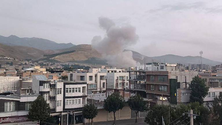 This handout photo released by Iran's Revolutionary Guard Corps (IRGC) official Sepah News Telegram channel on June 13, 2025 reportedly shows smoke billowing from a site targeted by an Israeli strike in the Iranian capital Tehran early in the morning. - AFPPIX