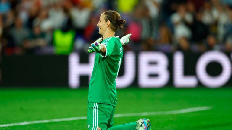 Germany’s Ann-Katrin Berger celebrates after winning the penalty shootout REUTERS