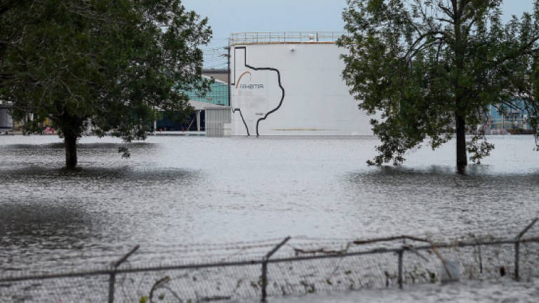 'Two explosions' at flooded Texas chemical plant