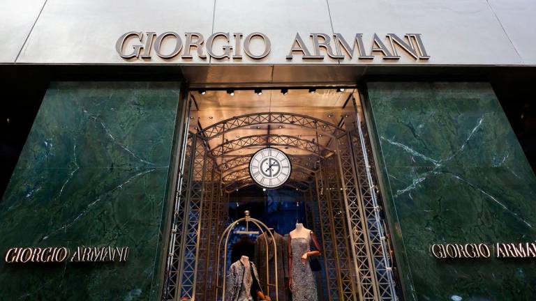 FILE PHOTO: A Giorgio Armani store in Milan, Italy, September 24, 2025. REUTERS/Yara Nardi/File Photo