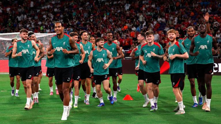 Liverpool’s Virgil van Dijk with teammates during training - REUTERSpix