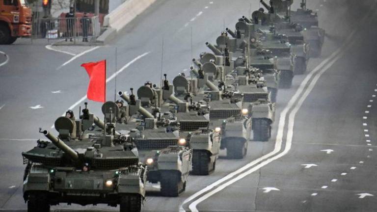 Russian T-90M tanks drive through central Moscow during a rehearsal for the Victory Day parade where Russia will celebrate the 80th anniversary of the 1945 defeat of Nazi Germany, on May 3, 2025. AFPpix