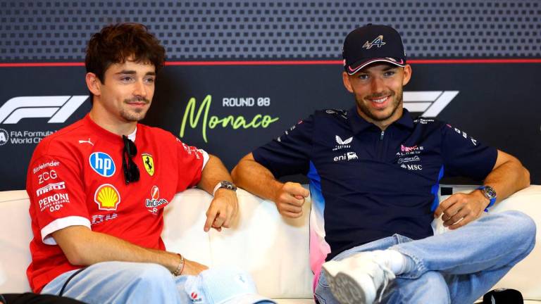 Charles Leclerc and Lewis Hamilton - REUTERS/Piroschka Van De Wouw