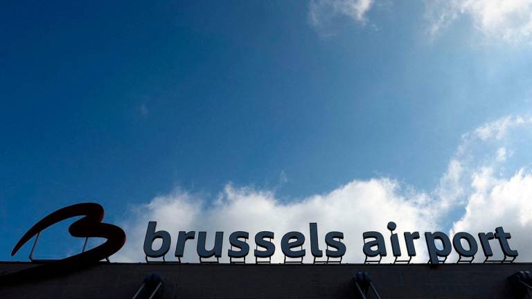 FILE PHOTO: The logo of Brussels international airport is seen outside the terminal in Zaventem, Belgium March 31, 2025. REUTERS/Yves Herman/File Photo