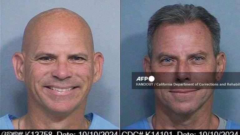 (COMBO) This combination of pictures courtesy of California Department of Corrections and Rehabilitation (CDCR) created on April 14, 2025 shows Lyle Menendez (L) and Erik Menendez (R) mugshots from October 10, 2024. - HANDOUT / California Department of Corrections and Rehabilitation / AFP
