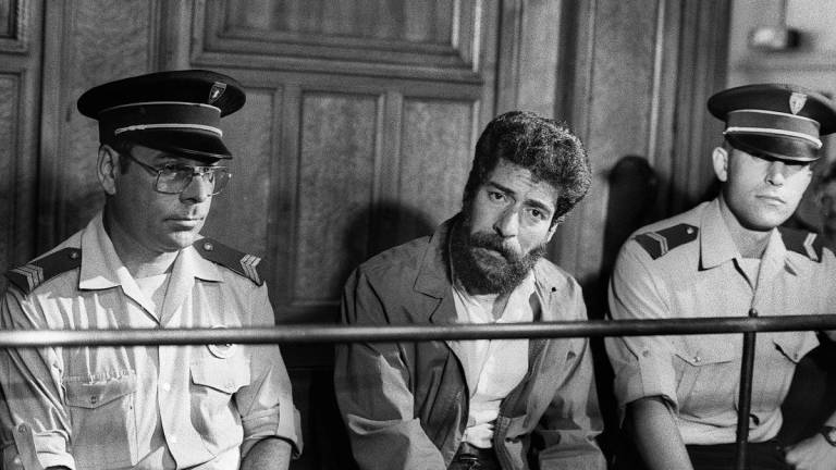 (FILES) A Picture taken July 3, 1986 shows former Lebanese militiaman George Ibrahim Abdallah during his trial for being an accomplice in the murder of two diplomats including Charles Ray of the US and Israeli Yacov Barsimantov, for which Abdallah was condemned to life prison. - Michel VAURIS-GRAVOS and Jean-Marc COLLIGNON / AFP