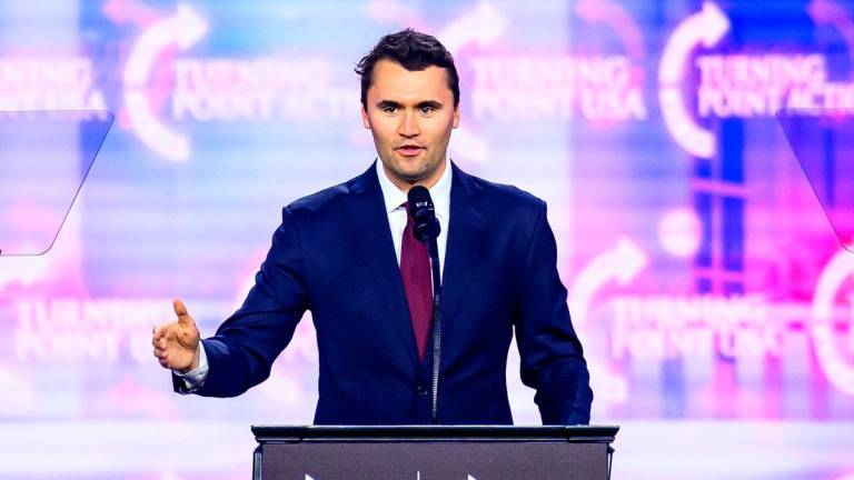 US right-wing activist Charlie Kirk speaks on stage at America Fest 2024 in Phoenix, Arizona, on December 22, 2024. Right-wing youth activist and influencer Charlie Kirk, a major ally of President Donald Trump, was shot dead on September 10, 2025 in a murder that sparked fears of more political violence in an increasingly febrile United States. Trump confirmed on social media that Kirk, 31, had died from his injuries.