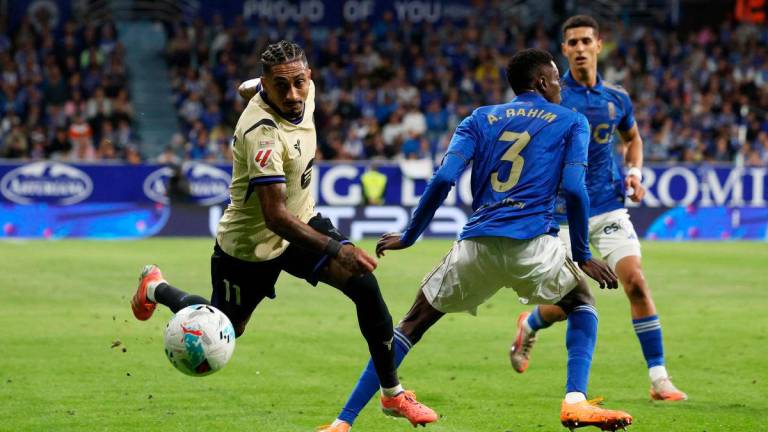 FC Barcelona’s Raphinha in action with Real Oviedo’s Rahim Alhassane REUTERS