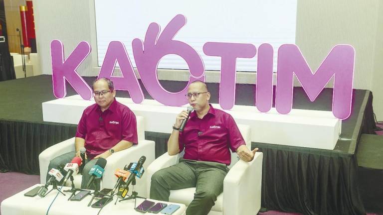 From left: Syarikat Takaful Malaysia Am CEO Mohamed Sabri Ramli and Nor Azlan at the press conference after the launch. – Adib Rawi Yahya/theSun
