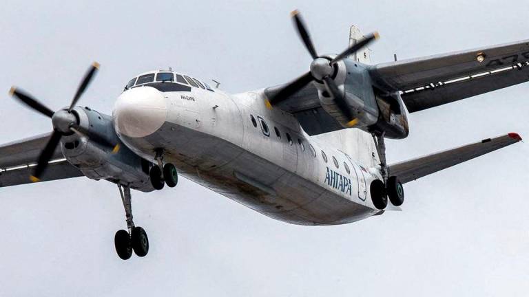An An-24 aircraft of Angara Airlines lands at the airport of Irkutsk, Russia April 13, 2014. REUTERS/Marina Lystseva/File Photo