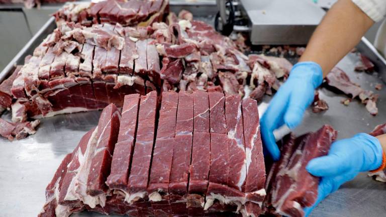 An employee works at the assembly line of jerked beef at a plant of JBS S.A, the world’s largest beef producer, in Santana de Parnaiba - Reuterspix
