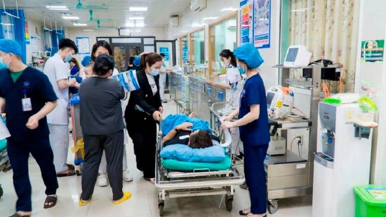 Nine people were hospitalized after drinking alcohol stored in a plastic bottle that had earlier contained a harmful chemical in Tuyen Quang Province, northern Vietnam. Photo: Tuoi Tre News