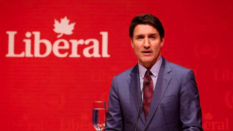 Canada's Prime Minister Justin Trudeau speaks at the Laurier Club holiday party in Gatineau, Quebec, Canada, December 16, 2024. - REUTERSPIX