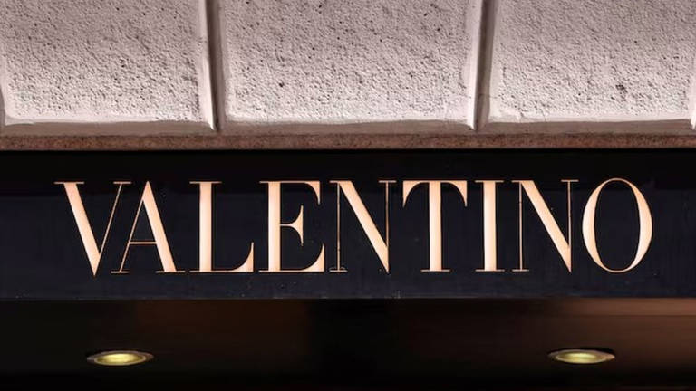 The logo of fashion house Valentino is seen outside a shop in Milan, Italy, April 8, 2024. - REUTERS