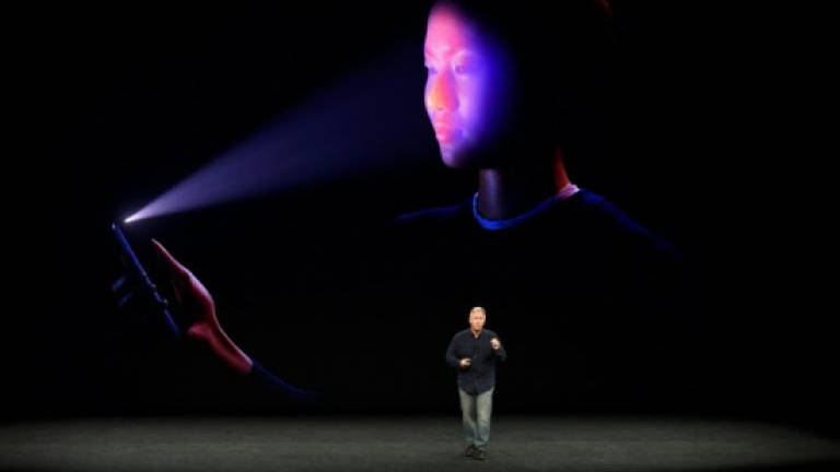 New iPhone brings face recognition (and fears) to the masses