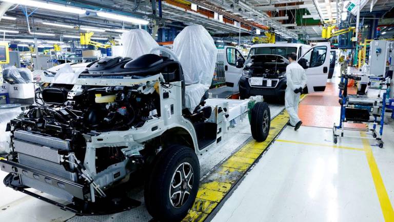 FILE PHOTO: Staff members work at the assembly line of Stellantis’ Sevel van-making plant in Atessa, Italy, January 23, 2024. REUTERS/Remo Casilli/File Photo