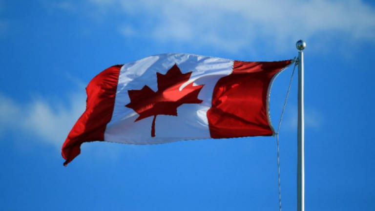 22 migrants flee US, brave cold to claim refuge in Canada