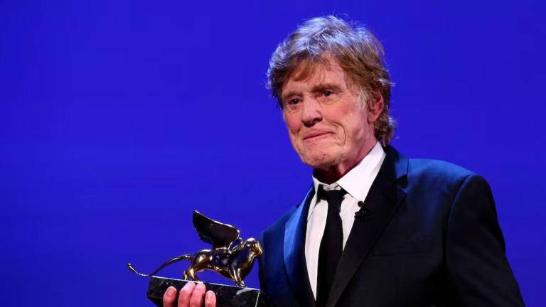 Actor Robert Redford receives a Golden Lion award for lifetime achievement at the 74th Venice Film Festival in Venice, Italy, September 1, 2017. REUTERS/Alessandro Bianchi/File Photo