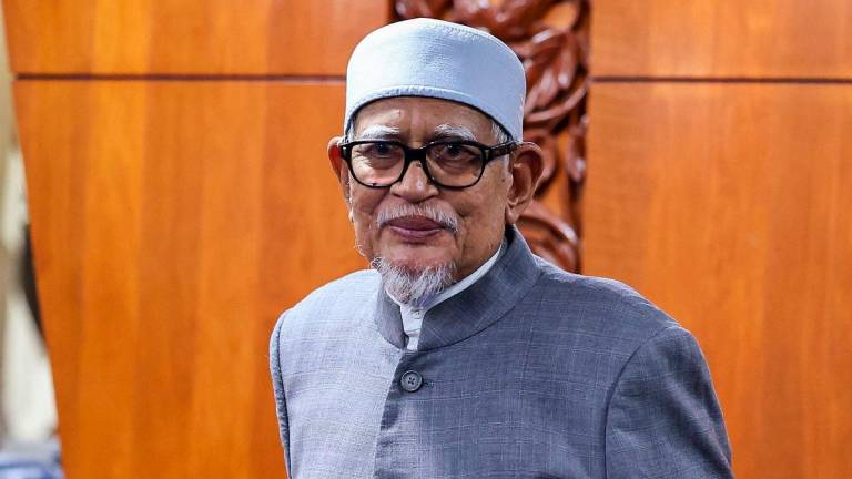 PAS president Tan Sri Abdul Hadi Awang - BERNAMApix