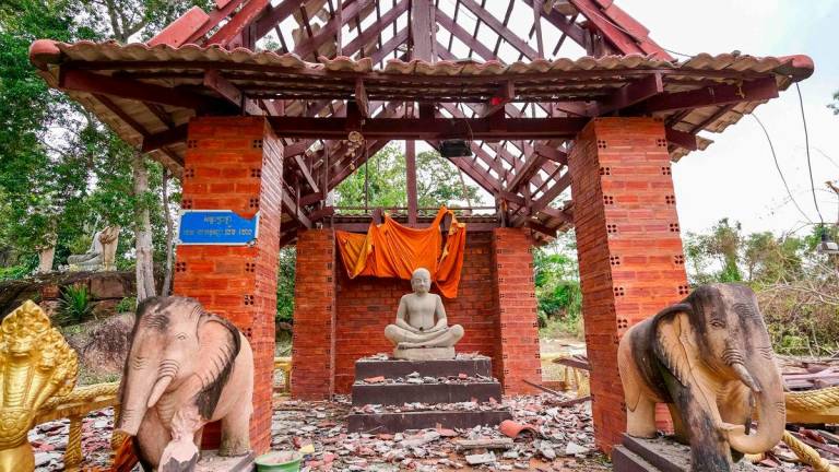 A pagoda damaged by Thai artillery is pictured in Oddar Meanchey province on July 25, 2025. AFPPix