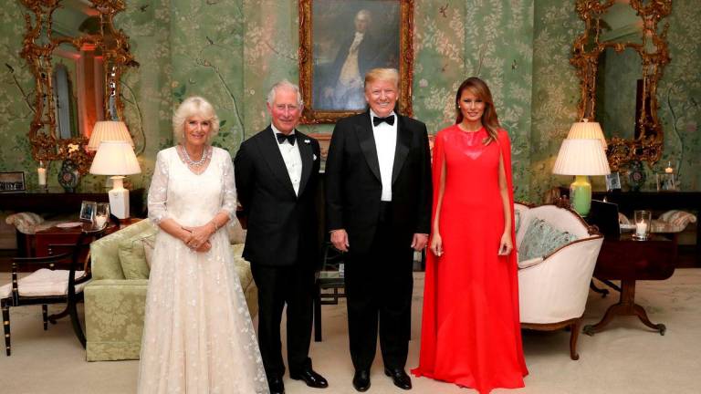 FILE PHOTO: U.S. President Donald Trump and first lady Melania Trump host a dinner for Britain’s Charles, Prince of Wales and Camilla, Duchess of Cornwall, at Winfield House, during their state visit in London, Britain June 4, 2019. Chris Jackson/Pool via REUTERS/File Photo