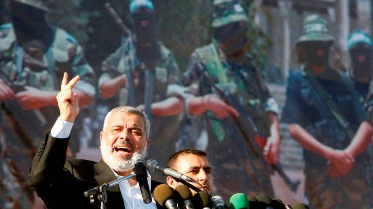 Senior Hamas leader Ismail Haniyeh delivers a speech during a rally marking the 21st anniversary of Hamas, in Gaza 2008 - REUTERSpix