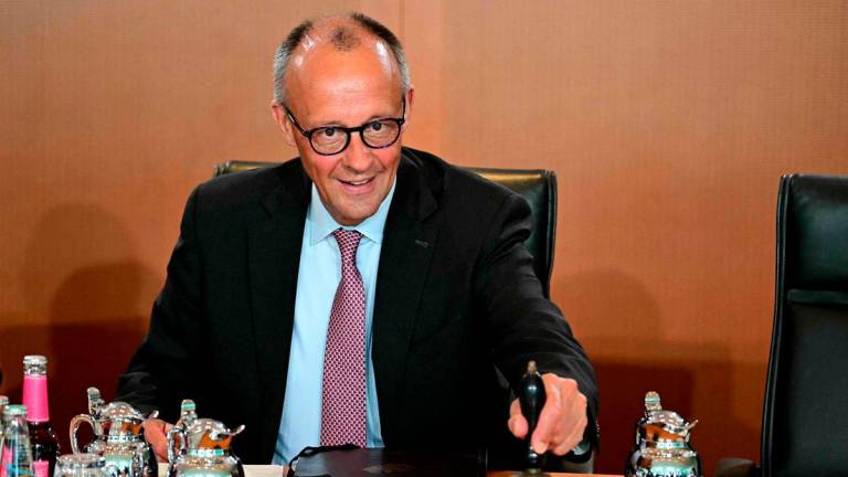 German Chancellor Friedrich Merz has taken seat to lead the weekly meeting of the German cabinet at the Chancellery in Berlin on July 2, 2025. (Photo by Tobias SCHWARZ / AFP)