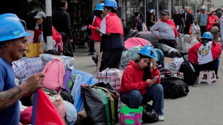 Informal artisanal miners stand near Congress as they take part in a protest to pressure the Peruvian government to extend the deadline to formalize informal mining operations, in Lima, Peru July 3, 2025. - REUTERSPIX