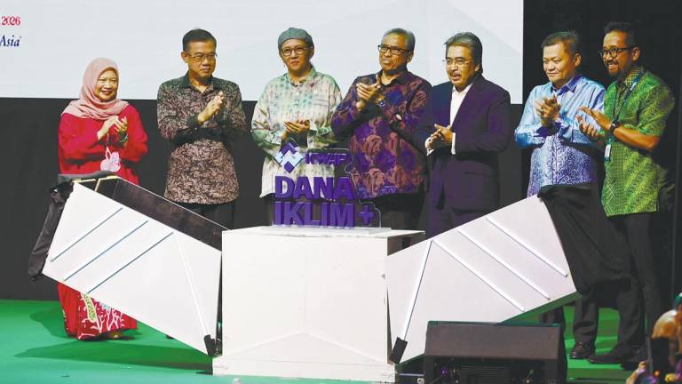 Johari (third, right) officiating the launch of Iklim+ KWAP Fund at the opening of the International Greentech and Eco Products Exhibition and Conference Malaysia (IGEM) 2025 and the Kuala Lumpur Sustainability Summit 2025 at the Kuala Lumpur Convention Centre today. – Bernamapic