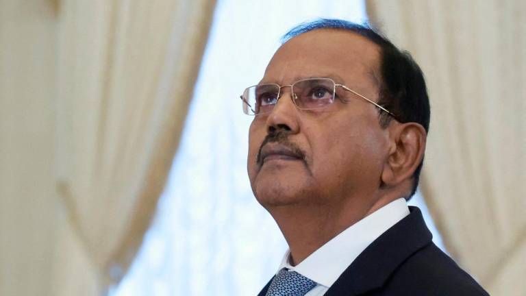 In this pool photograph distributed by the Russian state agency Sputnik, India's National Security Advisor Ajit Doval attends a meeting with Russia's President in Saint Petersburg on September 12, 2024. - Vyacheslav PROKOFYEV / POOL / AFP