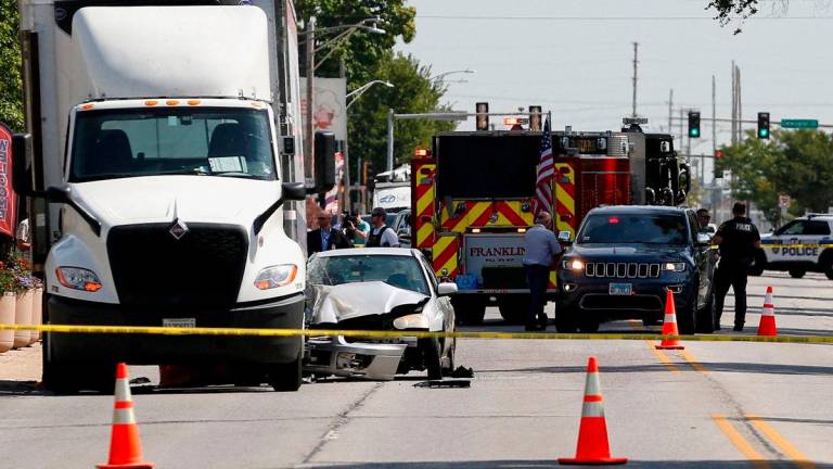 Police and first responders work at a cordoned-off area after a U.S. Immigration and Customs Enforcement (ICE) agent shot and killed a man as officers attempted to detain him, according to the Department of Homeland Security, in Franklin Park village, northwest of Chicago, in Cook County, Illinois, U.S., September 12, 2025. REUTERS/Octavio Jones TPX IMAGES OF THE DAY
