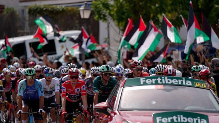 Cycling - Vuelta a Espana - Stage 20 - Robledo de Chavela to Bola del Mundo - Robledo de Chavela, Spain - September 13, 2025Pro Palestine protest can be seen before the start of stage 20 - REUTERSPIX