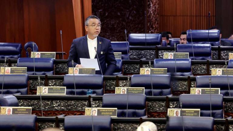 Deputy Defence Minister Adly Zahari, who is also the Member of Parliament for Alor Gajah, during the oral question-and-answer session in the Dewan Rakyat today. – BERNAMA