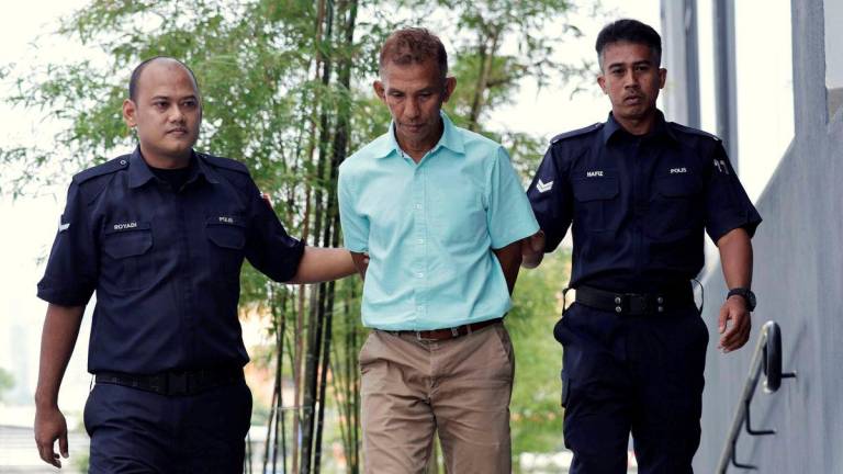 Jurulatih berbasikal Nor Effandy Rosli, 58, mengaku tidak bersalah di Mahkamah Sesyen Ampang hari ini atas pertuduhan melakukan amang seksual fizikal terhadap seorang pelatih berbasikal perempuan, tahun lepas -BERNAMA