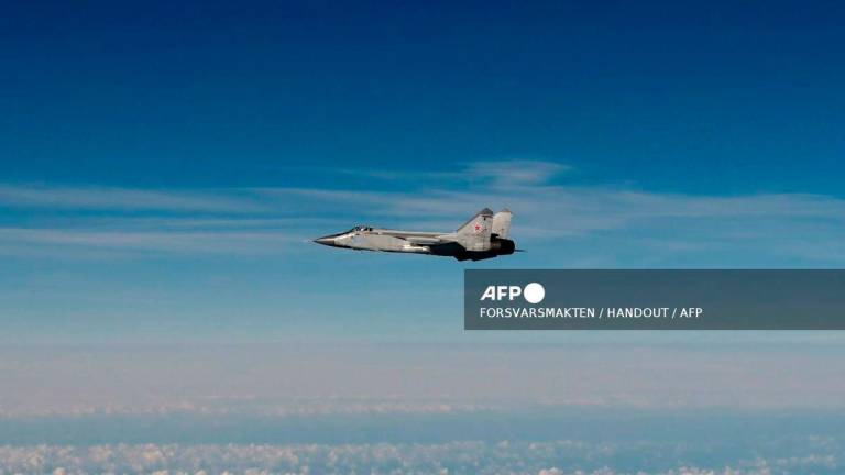 This September 19, 2025 Hand Out image released by the Swedish Airforce shows a Russian MIG-31 fighter jet flying above the Baltic sea after violating Estonian air space. - HANDOUT / AFP
