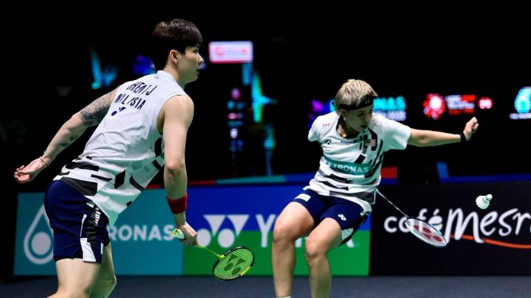 National mixed double pairs Chen Tang Jie and Toh Ee Wei - Photo by BERNAMA