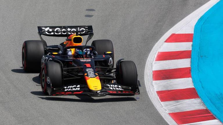 Red Bull’s Dutch driver Max Verstappen competes in the Formula One Spanish Grand Prix at the Circuit de Catalunya in Montmelo, on the outskirts of Barcelona, on June 1, 2025. (Photo by Pierre-Philippe MARCOU / AFP)