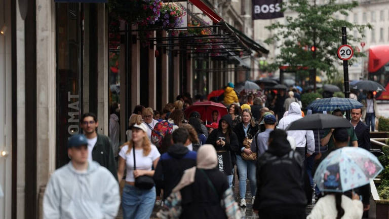 Shoppers walk along Regent Street in London, Britain, July 9, 2024. - REUTERS