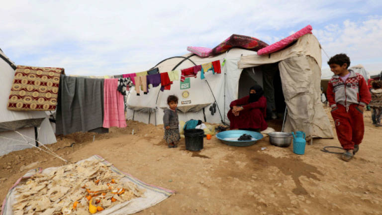 Displaced Syrians survive war but face battle against cold