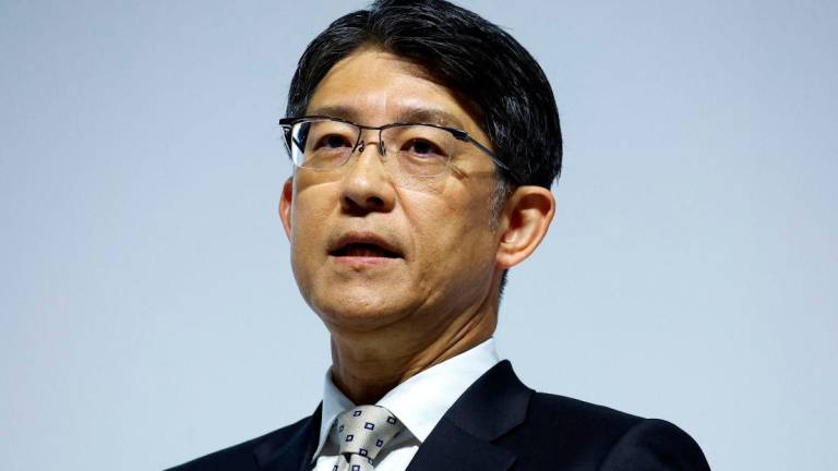 Toyota Motor CEO Koji Sato attends a press briefing for their financial results in Tokyo, Japan May 8, 2025. REUTERSpix
