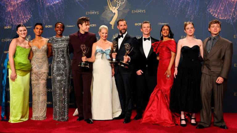 Noah Wyle, Best Actor in a Drama Series, Katherine LaNasa, Best Supporting Actress in a Drama Series, and team of “The Pitt”, which won Best Drama Series, pose at the 77th Primetime Emmy Awards in Los Angeles, California, U.S., September 14, 2025. REUTERS/Daniel Cole