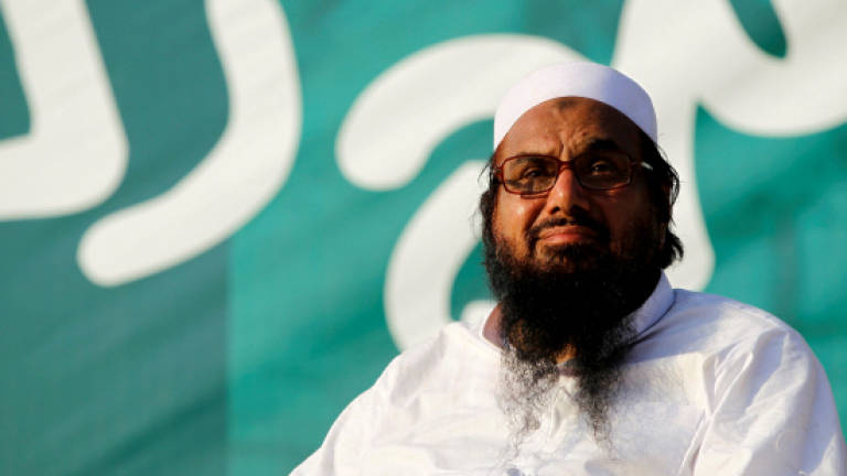 Pakistan cracks down on group linked to Mumbai attacks