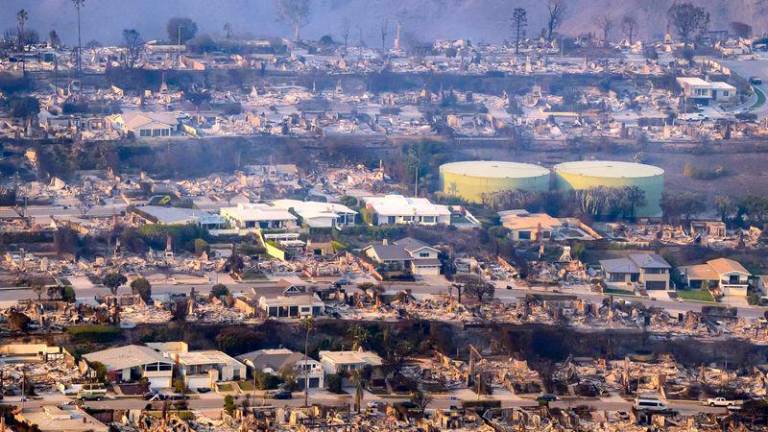 In this aerial view taken from a helicopter, burned homes are seen from above during the Palisades fire in Los Angeles county, California on January 9, 2025. AFPpix