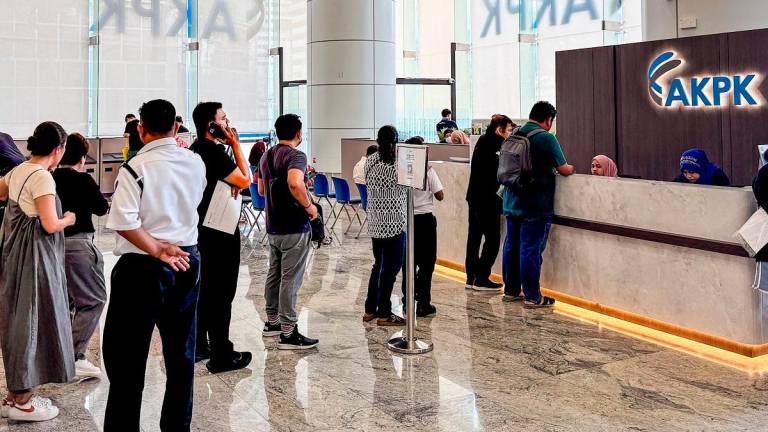 Many people are unaware of the options available to deal with debts, such as making withdrawals from their Employees Provident Fund to settle part of their housing loans. – ADAM AMIR HAMZAH/THESUN