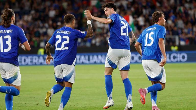 Italy’s Alessandro Bastoni celebrates scoring their fifth goal with Giovanni Di Lorenzo REUTERSPix