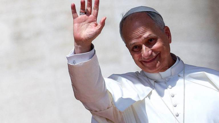 Pope Leo XIV waves on the day he holds a general audience in St. Peter’s Square, at the Vatican June 4, 2025. REUTERS