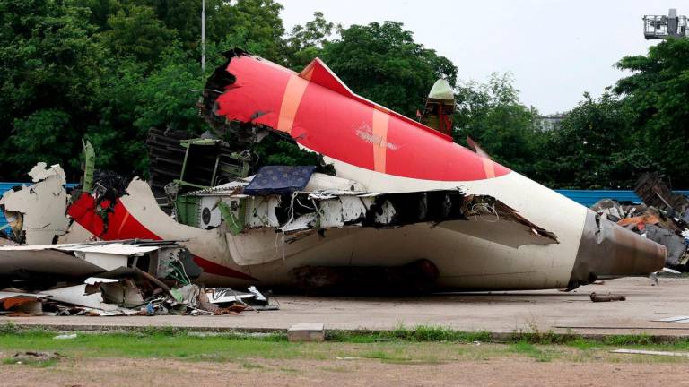 Wreckage of the Air India Boeing 787-8 Dreamliner plane sits on the open ground, outside Sardar Vallabhbhai Patel International Airport, where it took off and crashed nearby shortly afterwards, in Ahmedabad, India July 12, 2025. REUTERS/Amit Dave/File Photo