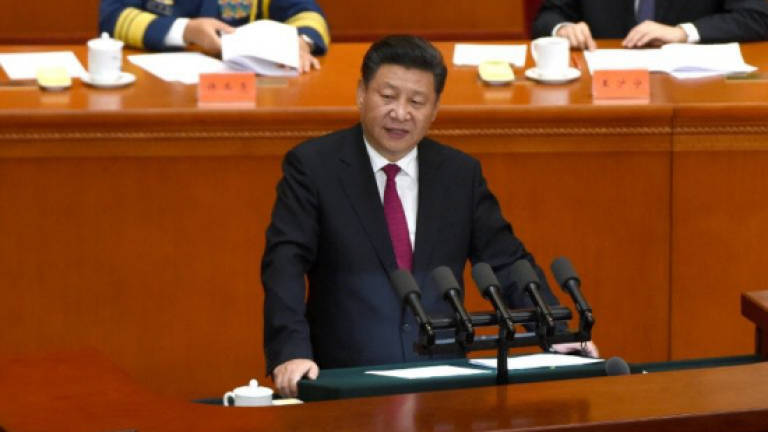 China's president talks tough ahead of tribunal ruling